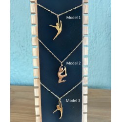 goudkleurige ketting danser/turnster