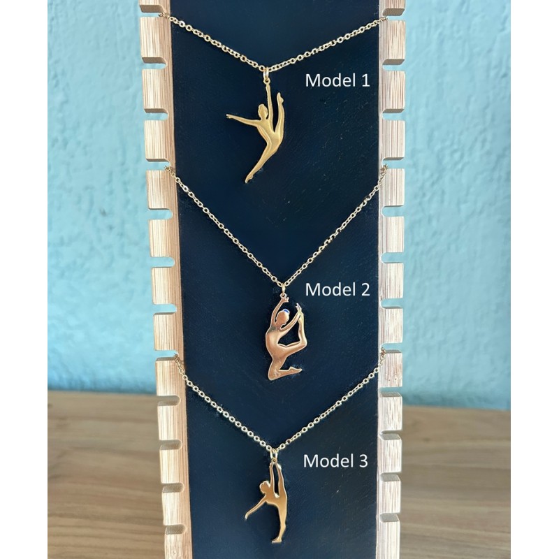 gold colored necklace modern dancer/ gymnast