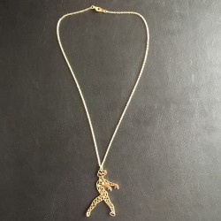 gold necklace modern dancer
